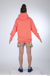 Nigel a-pose blue sneakers dressed floral printed shorts salmon hoodie…